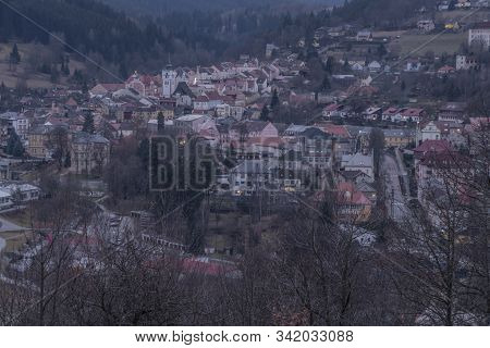 View Over Vimperk Town In Winter Dark Cold Evening