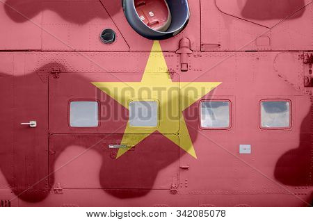 Vietnam Flag Depicted On Side Part Of Military Armored Helicopter Closeup. Army Forces Aircraft Conc