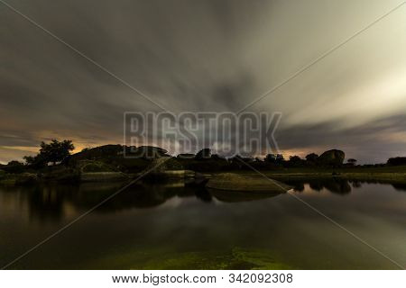 Night Landscape In The Barruecos Natural Area. Extremadura. Spain.
