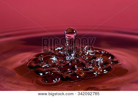 Water Drop Collision With Abstract Effect. Macro.