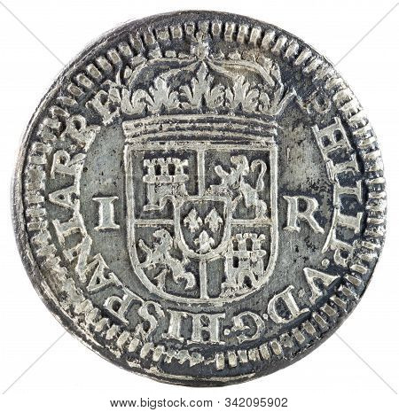 Ancient Spanish Silver Coin Of The King Felipe V. 1707. Coined In Segovia. Real. Obverse.