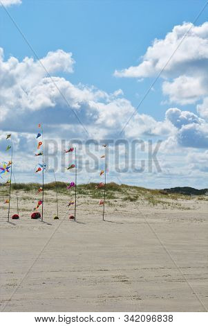 Romo Peninsula - Fantastic Beach In Denmark With Colorful Wind Chimes. Cloudy Summer Day