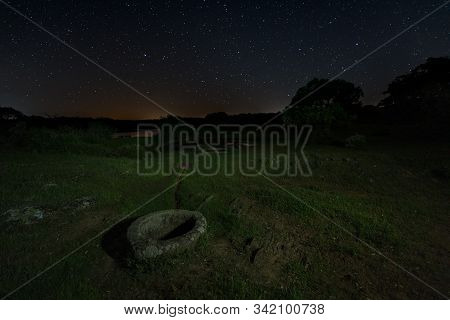 Night Landscape With Ancient Well. Montehermoso. Extremadura. Spain.
