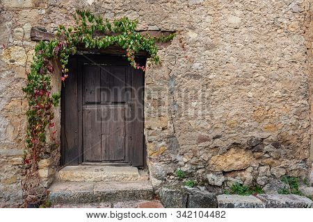 Old Small Door In The Historical Village Of Pedraza. Segovia Spain.