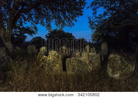 Landscape At Dusk With Ancient Prehistoric Dolmen. Gran Dolmen In Montehermoso. Extremadura Spain.