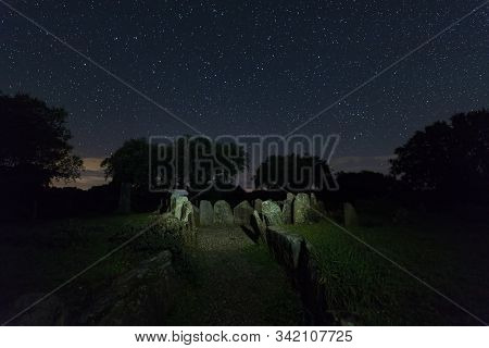 Dolmen Of The Great Oak. Night Landscape With Ancient Prehistoric Dolmen. Montehermoso. Extremadura.