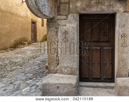 Door With Antique Prints In The Ancient Village Of La Alberca. Salamanca. Spain.