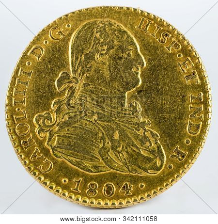 Ancient Spanish Gold Coin Of King Carlos Iv. With A Value Of 2 Escudos And Minted In Seville. 1804. 