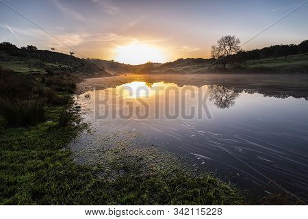 Sunrise In The Salor River, Near Aliseda. Extremadura. Spain.