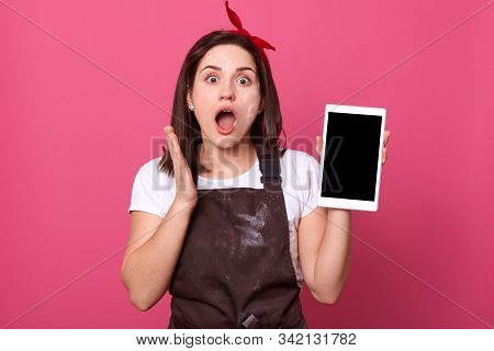 Brunette Female Chef, Cook Or Baker Holding Tablet With Blank Screen. Cooking In Hands, Attarctive G