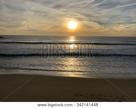 Bright Sunset On The Beach Of Costa Da Caparica, Portugal