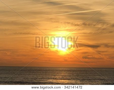 Bright Sunset On The Beach Of Costa Da Caparica, Portugal