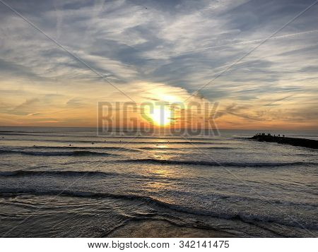 Bright Sunset On The Beach Of Costa Da Caparica, Portugal