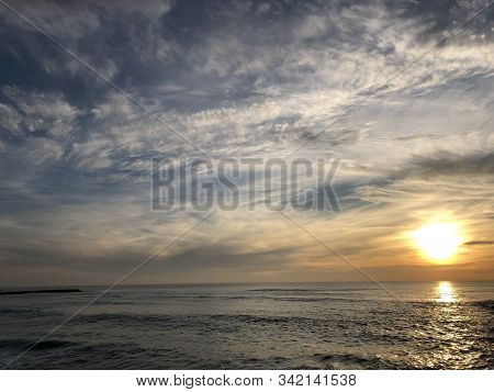 Bright Sunset On The Beach Of Costa Da Caparica, Portugal