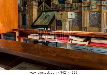 Jerusalem, Israel, December 28, 2018 : Holy Books In Arabic Lay On A Bench For Prayer In The Hall Of
