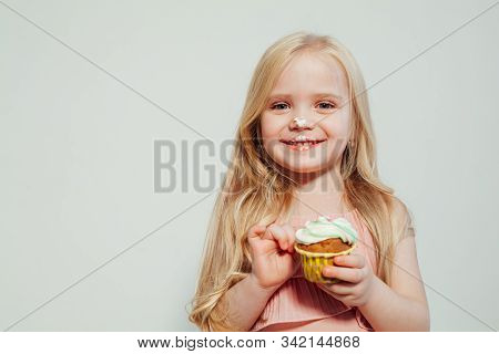Beautiful Little Girl Blonde With Cake And Candy Portrait Of Food