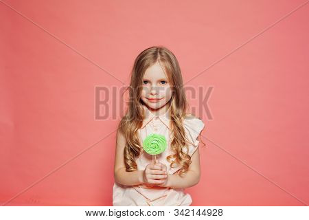 Beautiful Little Girl Blonde With Cake And Candy Portrait Of Food