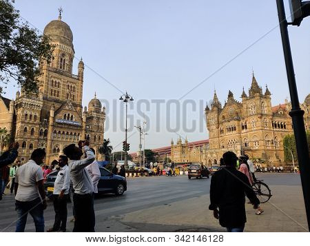 Mumbai, Maharashtra, India - December 2019: A candid street portrait of a handicapped vendor at a Te