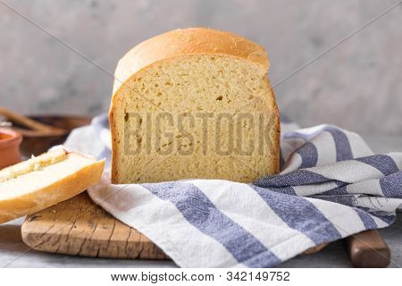 Fresh Homemade Crisp Bread  And Slices With Olive Oil, Butter And Green Olives, Top View.  Baking Co