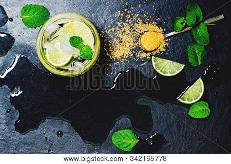 Refreshing Mint Cocktail Mojito On Black Stone Background