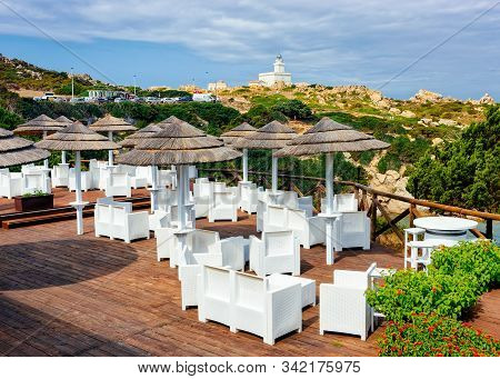 Street Cafe With Tables And Chairs At Capo Testa Sardegna