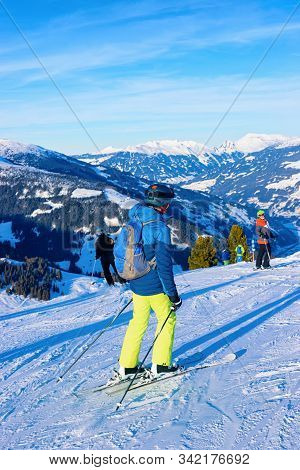 People Skier Skiing At Ski Resort Penken Park In Austria