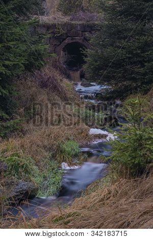 Upper Watercourse Of Creek Near Bilina River In Krusne Hory Mountains In Evening