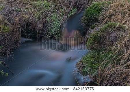 Upper Watercourse Of Creek Near Bilina River In Krusne Hory Mountains In Evening
