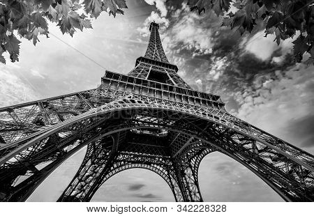 Eiffel Tower In Paris France. Eifel Tower With Golden Light Rays And Beautiful Architecture. Black A
