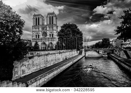 Notre Dame In Paris France. Notre Dame Cathedral With Siene River And Beautiful Gothic Architecture 