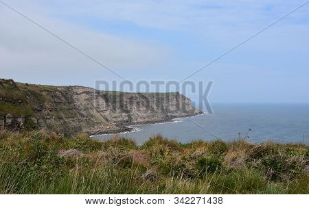 Beautiful Cliffs Over Robin Hood's Bay In United Kingdom