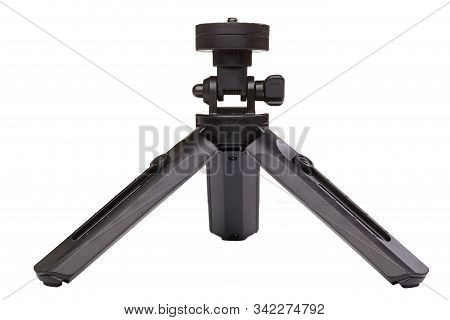 Small Black Tripod For Smartphone Isolated On White Background. Close Up.