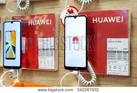 Minsk, Belarus - December 20, 2019: Huawei Smartphones In A Store Window Close-up. Huawei Technology