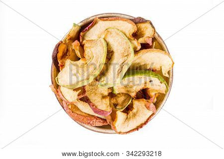 Heap Of Sun Dried Apple Slices Isolated On White Background. Top View
