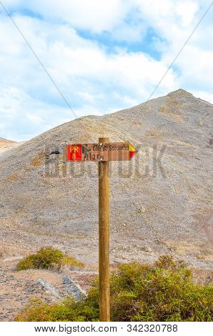 Wooden Tourist Sign Giving Direction In Ponta De Sao Lourenco, Madeira, Portugal. Hiking Path Leadin