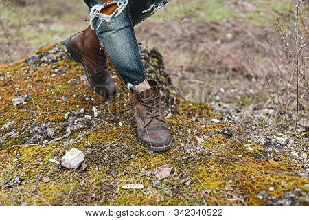 Guy Hiking In Comfortable Hiking Boots. Boots Close-up Stock Photo.