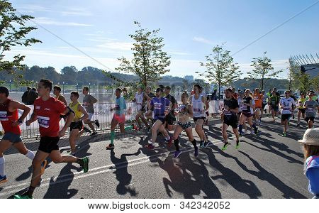 Warsaw, Poland - April 14, 2015: Orlen Warsaw Marathon. Group Of Athletes Running On A Street.