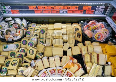 BERLIN, GERMANY - CIRCA SEPTEMBER, 2019: cheese display in Kaufland in Berlin. Kaufland is a German hypermarket chain, part of the Schwarz Gruppe which also owns Lidl and Handelshof.