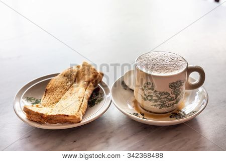 Traditional Chinese Coffee And Toast Bread At Kopitiam, Popular Breakfast Combination In Malaysia