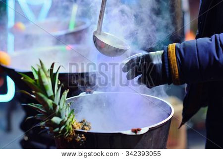 Christmas City Fair. Close Up View Of The Pot Filled With The Mulled Wine