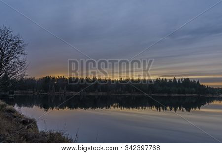 Ponds In Krusne Hory Mountains In Winter Cloudy Evening