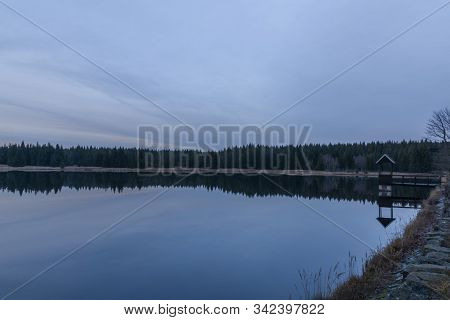 Ponds In Krusne Hory Mountains In Winter Cloudy Evening
