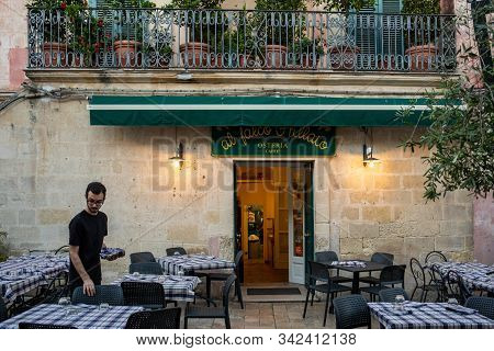 Matera, Italy - September 14, 2019: Evening View Of The City Of Matera, Italy, With The Colorful Lig