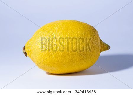 One Lemon Isolated On White Background. Tropical Fruit. Flat Lay, Top View