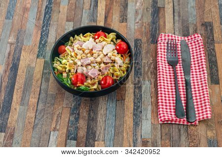 cereal specialties cooked with salad, roasted chicken aiguillette cured with salted and bacon