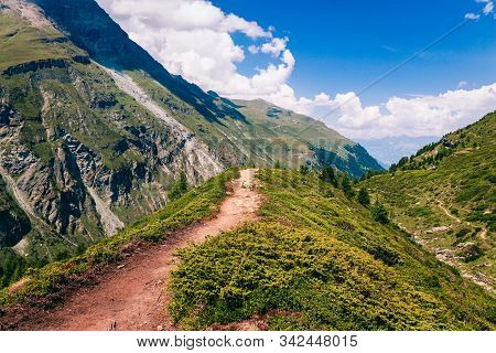 Dirt Hiking Trail High Up In The Pennine Alps Near Zinal In The Swiss Canton Valais