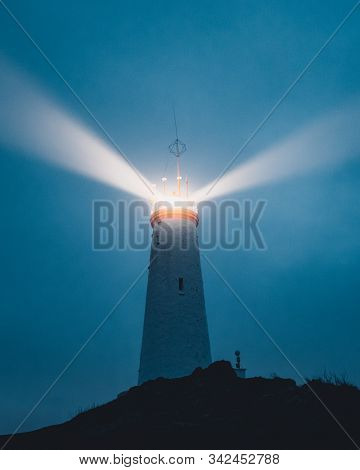 An Icelandic Lighthouse In The Moody Dark Night. Abstract Image, Dark Mood. Iceland