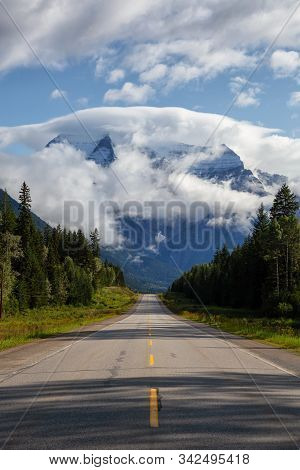 Beautiful View Of Yellowhead Highway With Mount Robson In The Background During A Cloudy Summer Morn