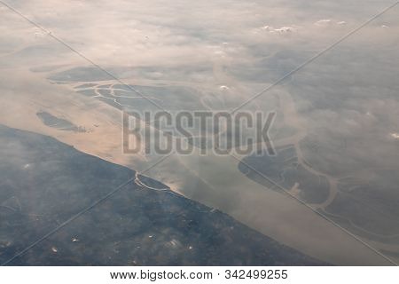 Aerial View Of The Magnificent Bramhaputra River In Bangladesh From The Airplane. Selective Focus.