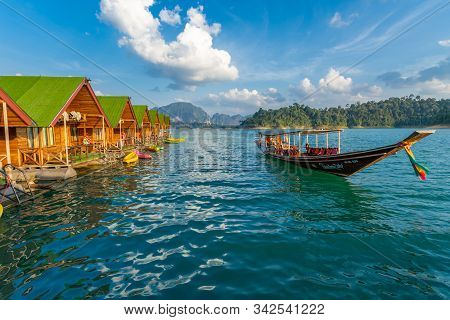 Surat Thani, Thailand - 28 December 2019 - Tour Boat Arrives At A Floating Resort To Pick Up Travell